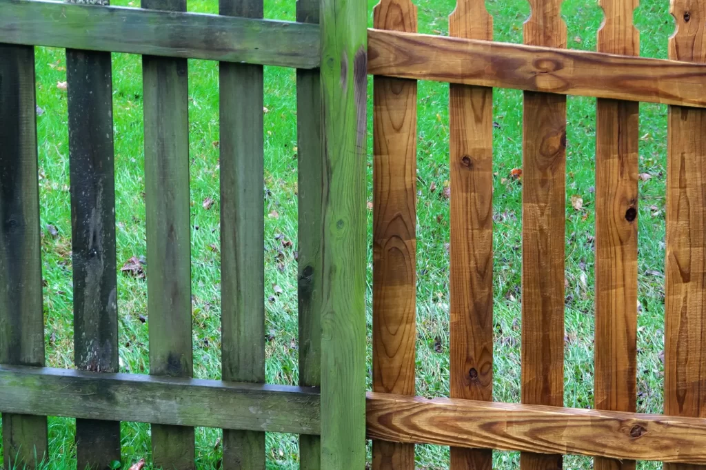 Wood picket fence before and after pressure washing. Before is dirty and old, after looks brand new